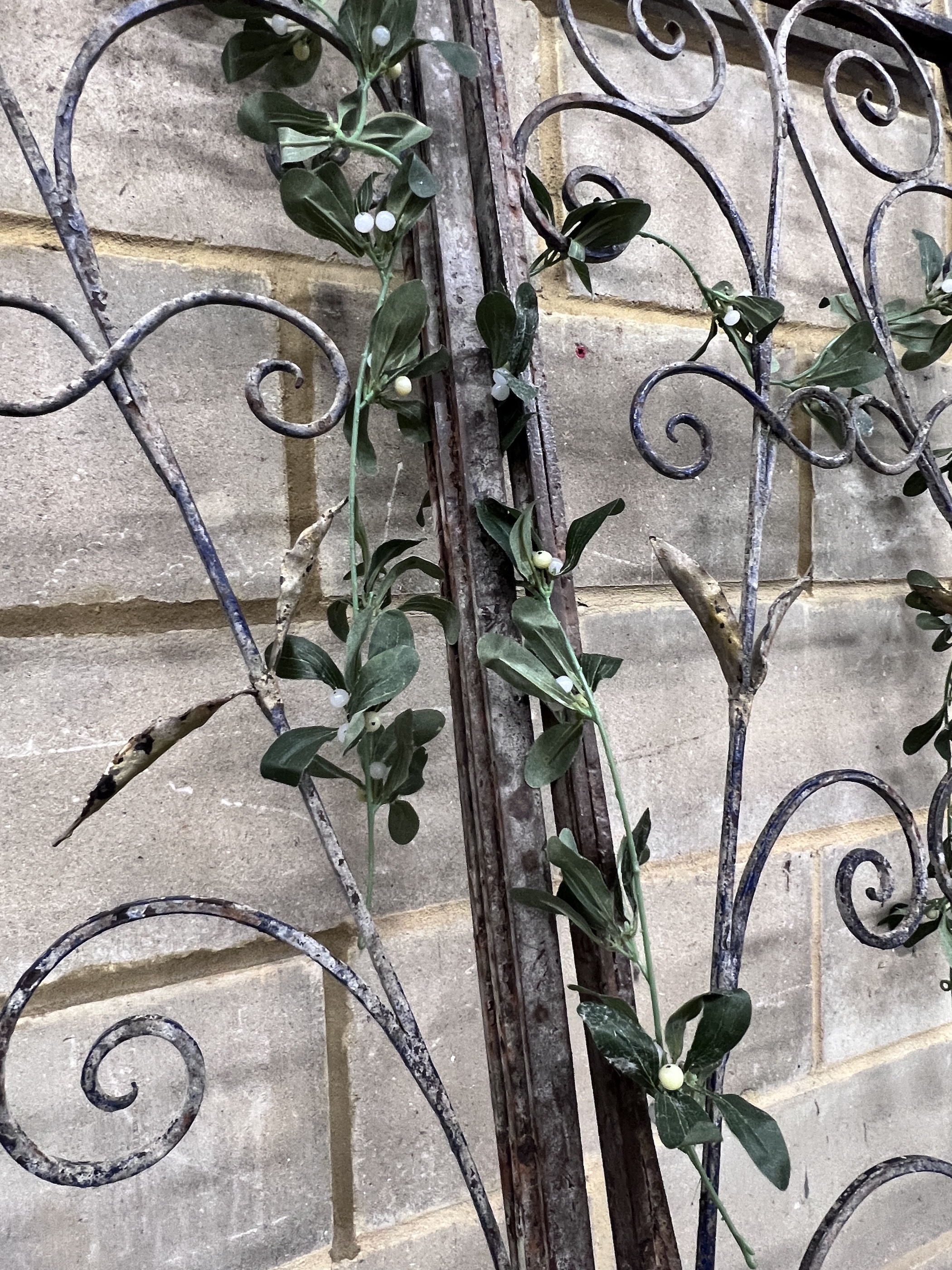 A pair of vintage French wrought iron gates, width 110cm, height 250cm